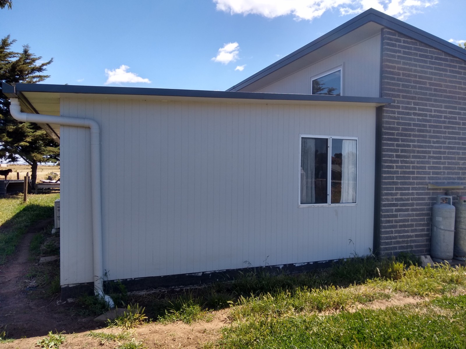 Panelspan® wall extension on existing brick home
